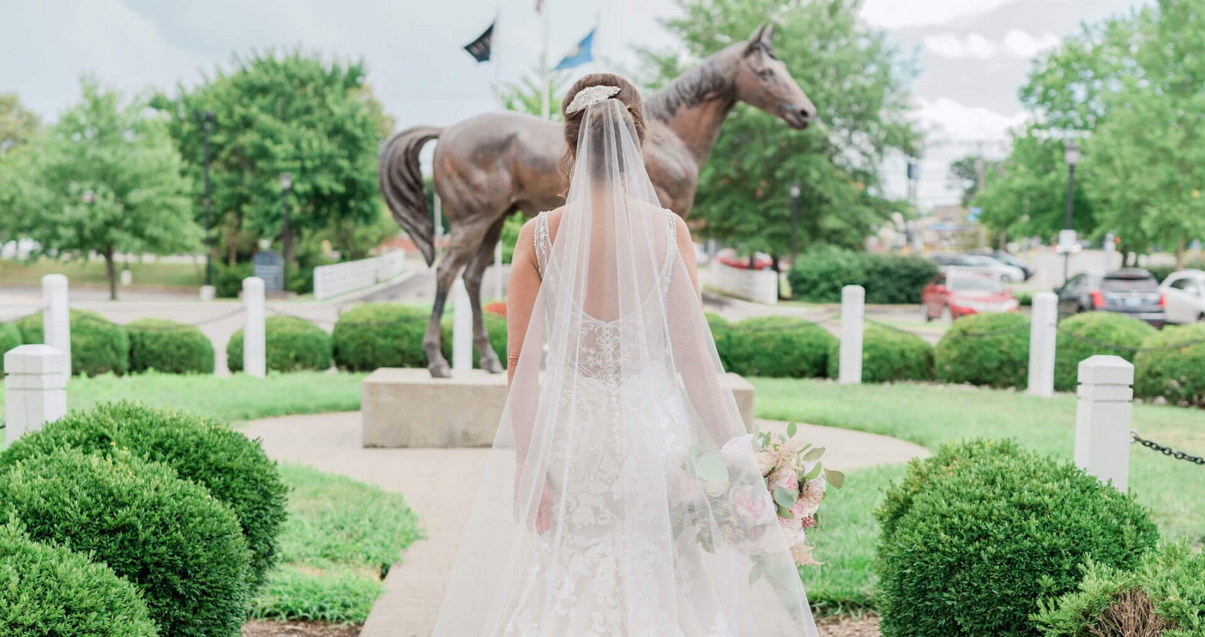 Bride in dress outside the hotel