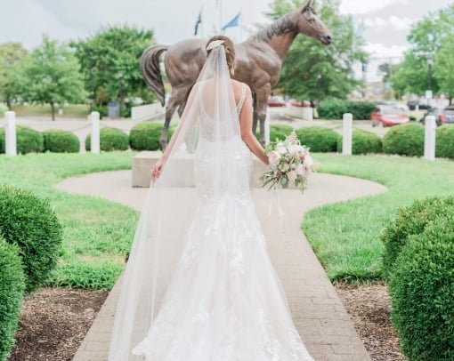 Bride in dress outside the hotel