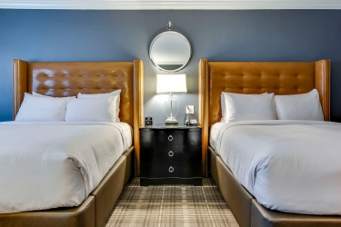 Two Double Beds and a side table
