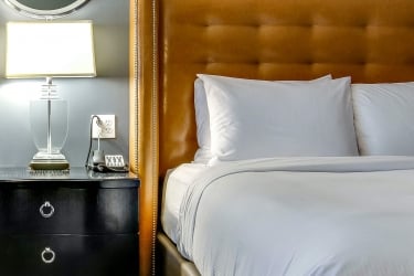 Close up of bed and bedside table