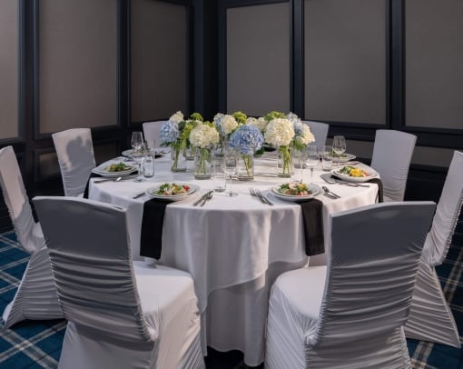 Wedding reception table with white tablecloth